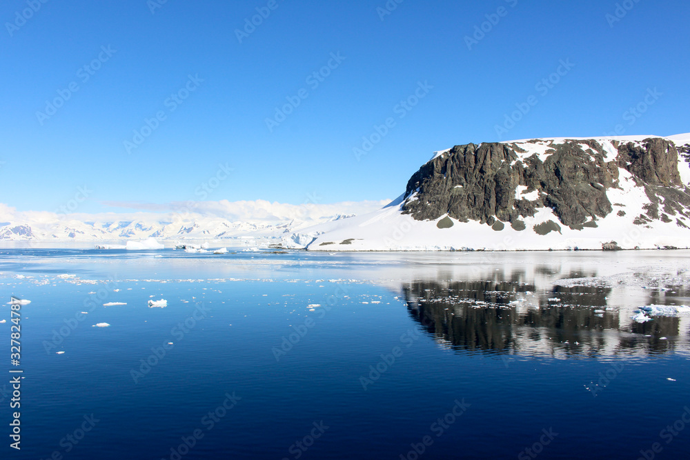 Snow-capped mountains along the coasts of the Antarctic Peninsula, Antarctica