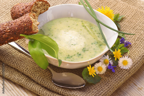 Soup with spring herbs, copy space