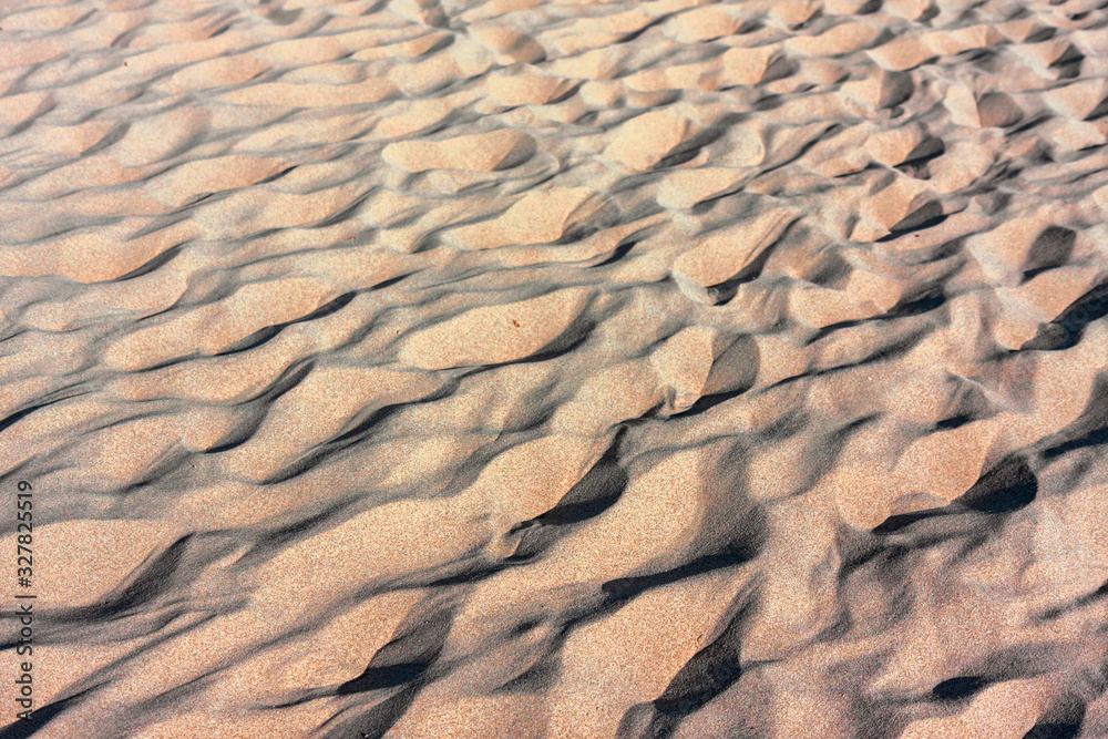 Footprints in the sand of the wild and sunny beaches of the Illetes in Formentera in the Balearic islands of Spain. Footprints in the sand of the wild and sunny beaches of the Illetes in Formentera in the Balearic islands of Spain.