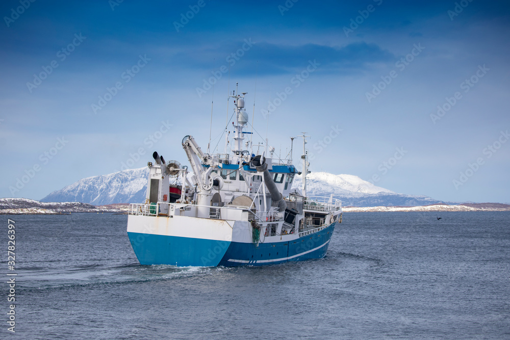 Fishingboat through Brønnøysundet, Nordland county - Meløyfjord Fishingboat through Brønnøysundet, Nordland county - Meløyfjord