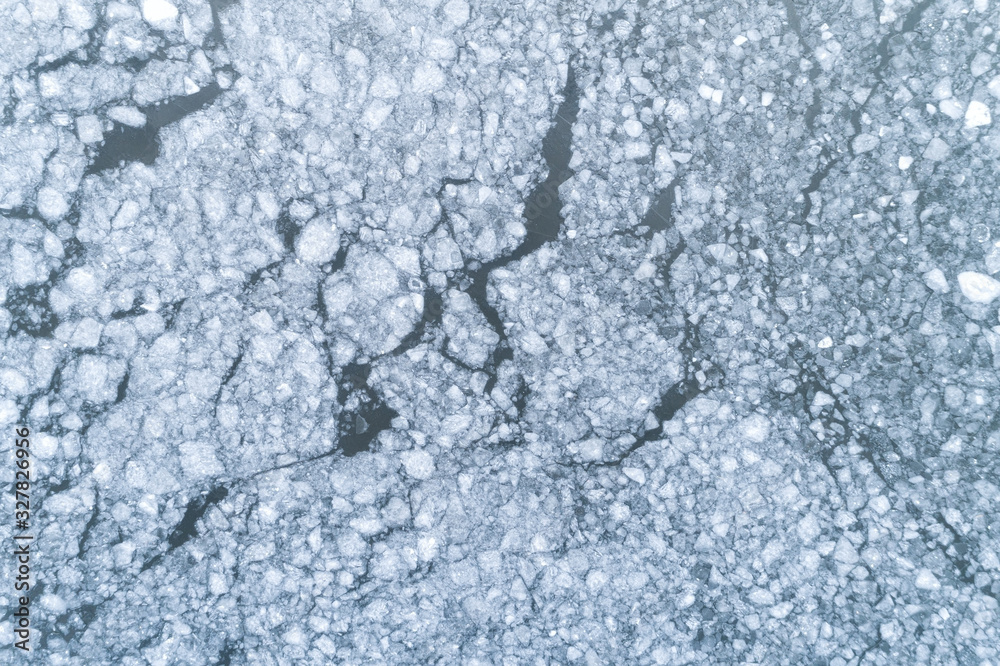 frost lake surface texture aerial view winter image. Cracked ice. frost lake surface texture aerial view winter image. Cracked ice.