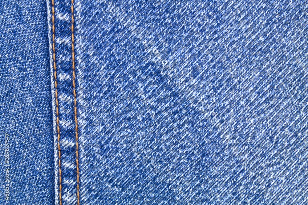 Blue denim jeans textile background Blue denim jeans textile background