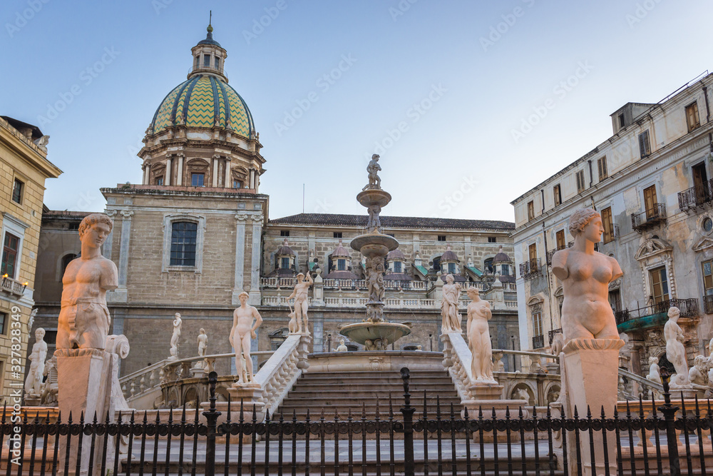 Praetorian Fountain and Church of San Giuseppe dei Teatini located on Pretoria Square also known as Square of Shame in Palermo, Italy