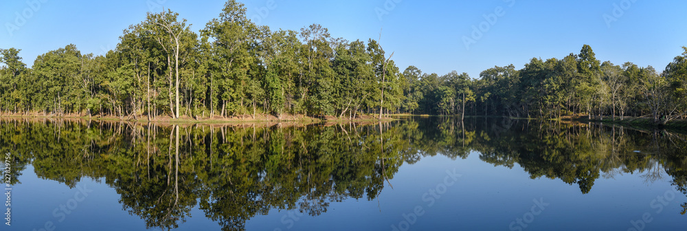 Beautiful quiet lake in Chitwan National Park on Nepal Beautiful quiet lake in Chitwan National Park on Nepal