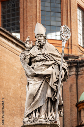 Marble statue of bishop San Petronio (1683), patron of the city and diocese of Bologna, Piazza di Porta Ravegnana, Emilia-Romagna, Italy, Europe. Sculptor Gabriele Brunelli (1615 - 1682). photo