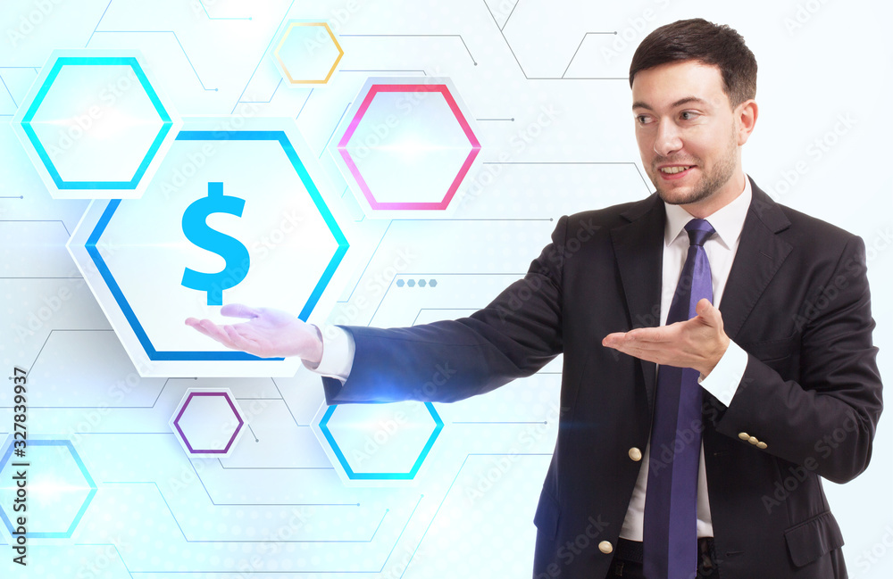 Business, Technology, Internet and network concept. Young businessman working on a virtual screen of the future and sees the inscription: Business, Technology, Internet and network concept. Young businessman working on a virtual screen of the future and sees the inscription: