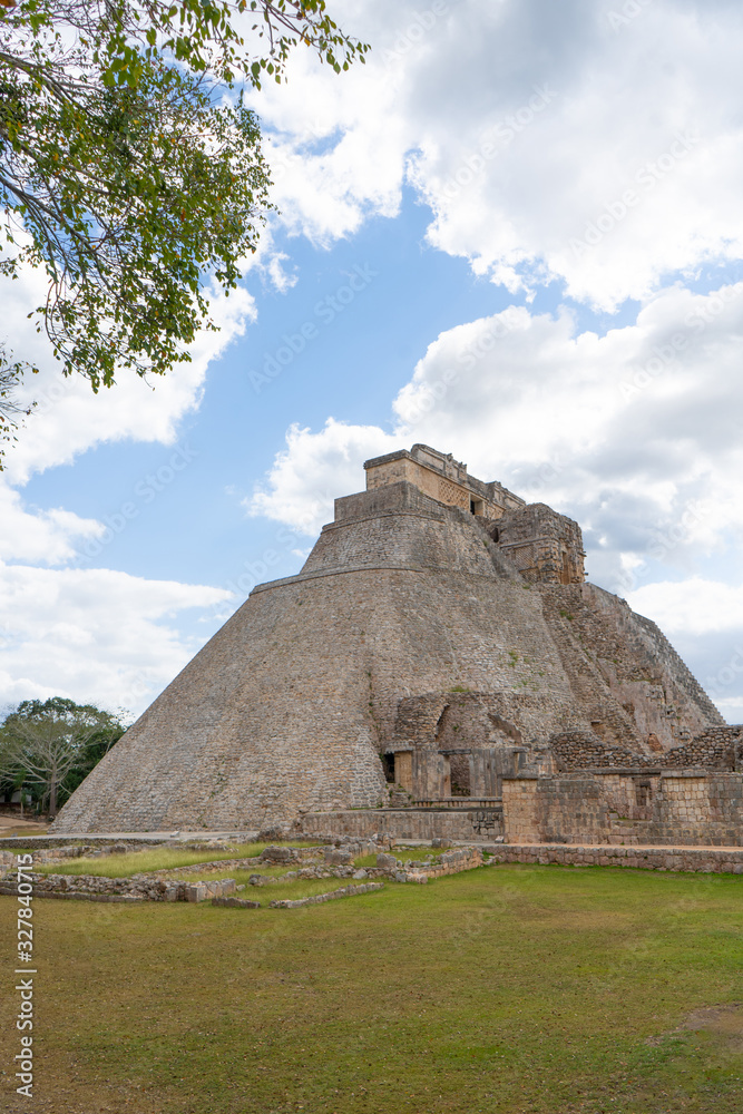 The Adivino (the Pyramid of the Magician or the Pyramid of the Dwarf). Uxmal an ancient Maya city of the classical period. Travel photo. Yucatan. Mexico. The Adivino (the Pyramid of the Magician or the Pyramid of the Dwarf). Uxmal an ancient Maya city of the classical period. Travel photo. Yucatan. Mexico.