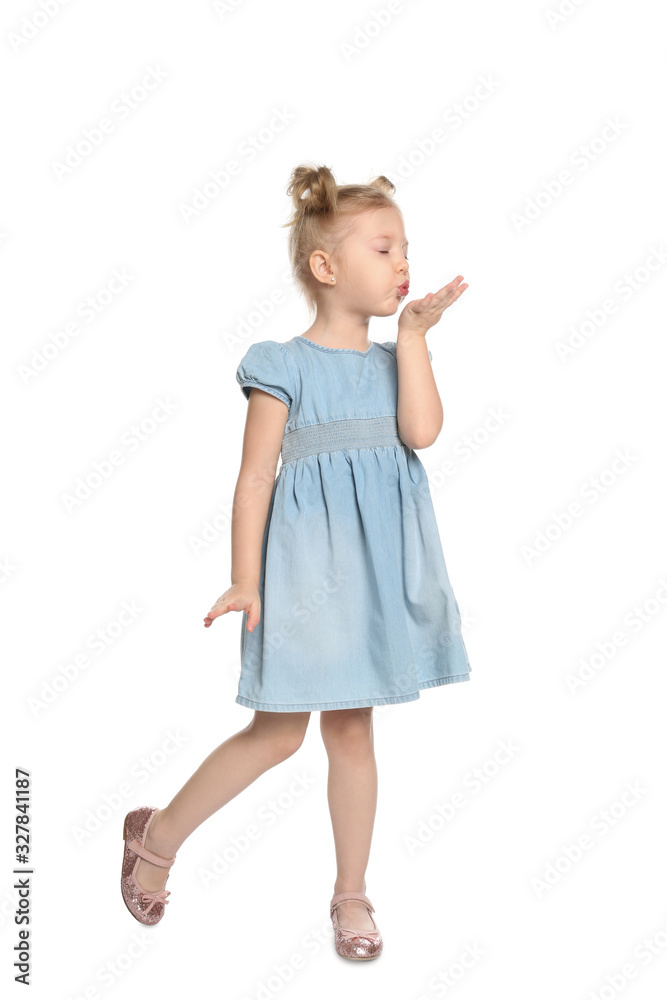 Cute little girl blowing air kiss on white background Cute little girl blowing air kiss on white background