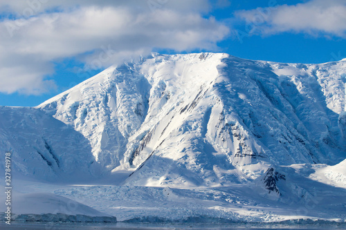 Snow-capped mountains and frozen coasts of the Antarctic Peninsula, Palmer Archipelago, Antarctica © Marco Ramerini