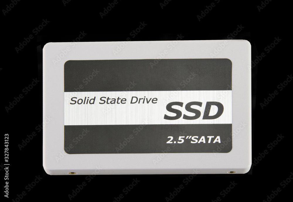SSD Solid-state drive. Fast hard drive for computer and data storage with SATA interface. White on a black background. SSD Solid-state drive. Fast hard drive for computer and data storage with SATA interface. White on a black background.