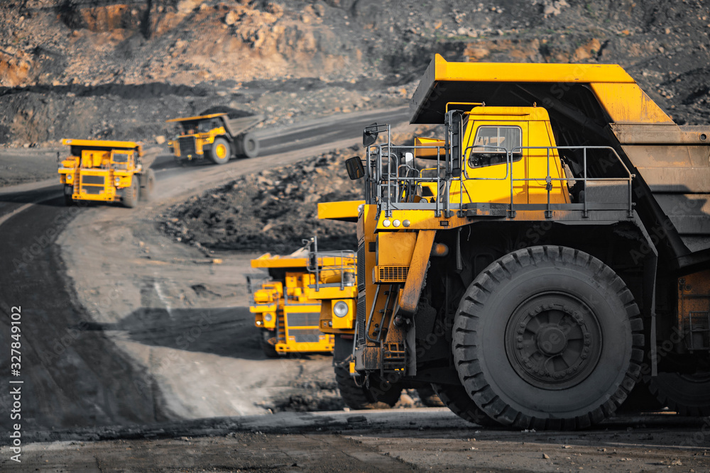 Open pit mine industry, big yellow mining truck for coal anthracite Open pit mine industry, big yellow mining truck for coal anthracite