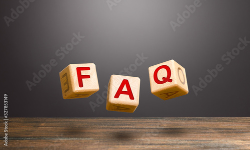 Foto Wooden blocks make word abbreviation FAQ (frequently asked questions)