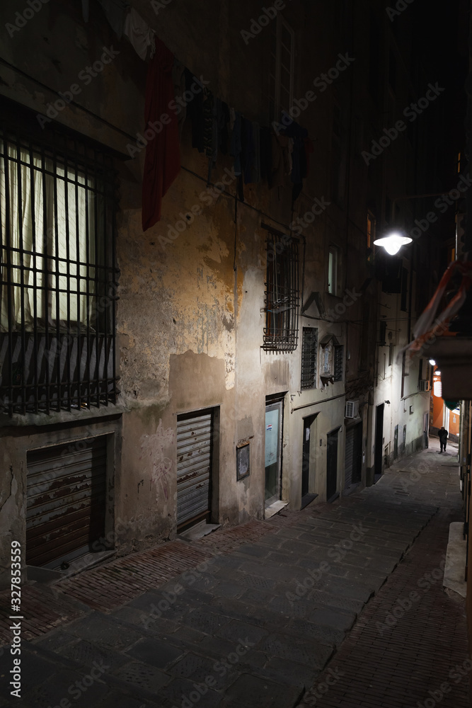 Vertical night street view of old Genova