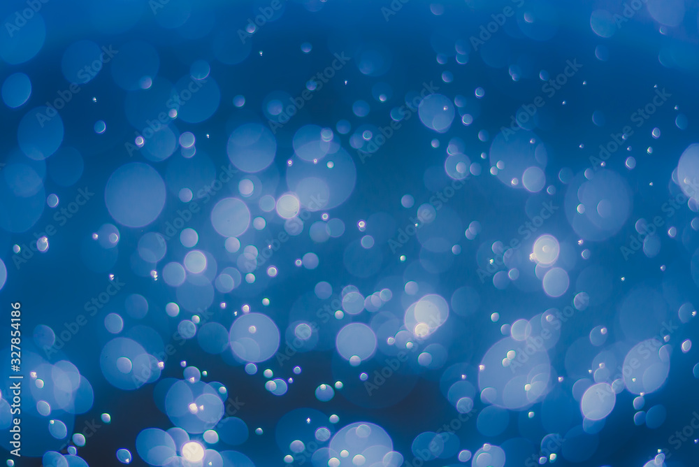 abstract sparkle bokeh light effect  with dark blue background, abstract bokeh background