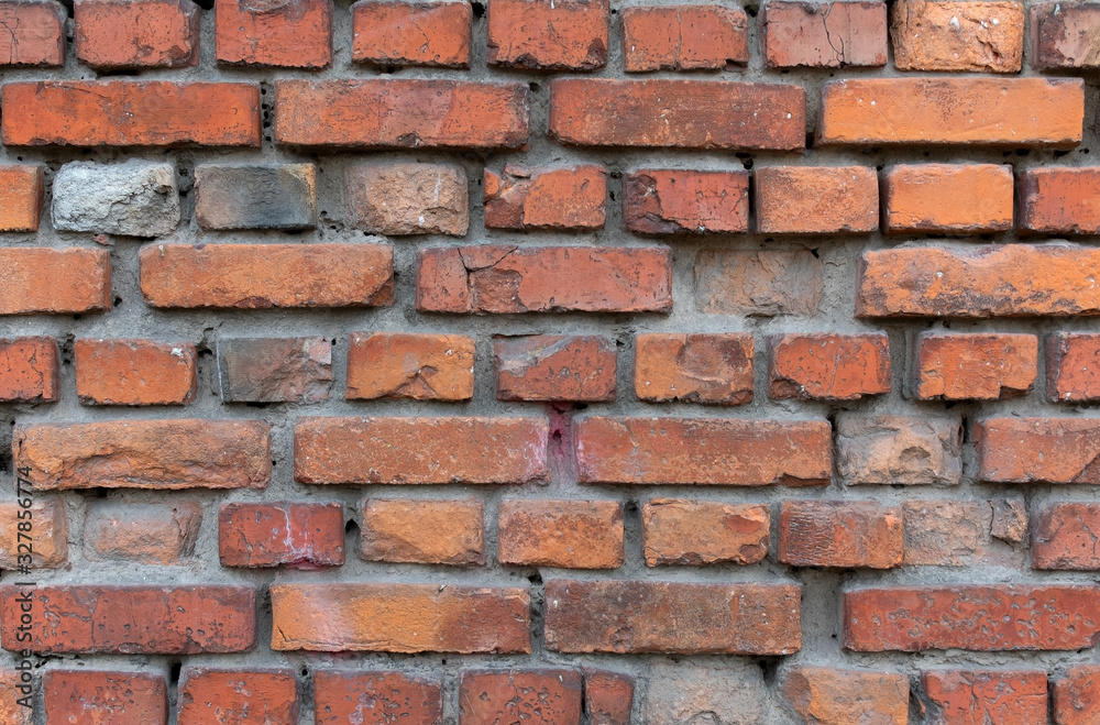 Old red bricks wall pattern for exterior and interior decoration. Grunge texture, old ruined wall Old red bricks wall pattern for exterior and interior decoration. Grunge texture, old ruined wall