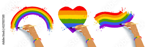 Set of hands drawing LGBTQ flags colors