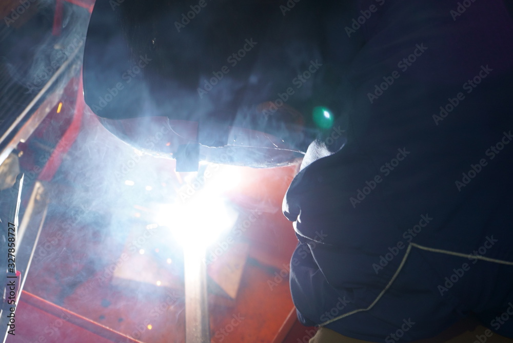 Dazzling light of welding work Dazzling light of welding work