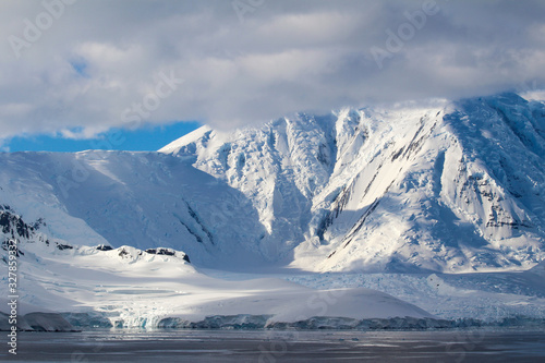 Snow-capped mountains and frozen coasts of the Antarctic Peninsula, Palmer Archipelago, Antarctica © Marco Ramerini