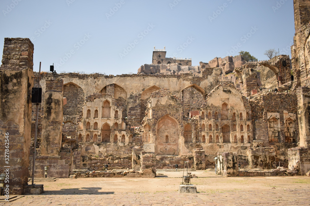 Old Historical Golconda Fort Ruined Walls in India Background stock photograph