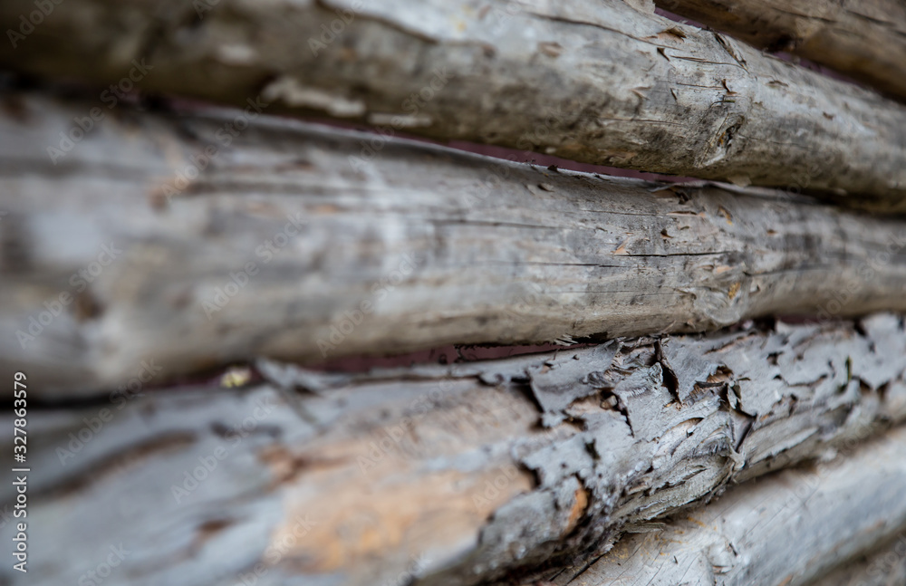 old gray colored wooden fence in a village or on a ranch. vintage style old gray colored wooden fence in a village or on a ranch. vintage style