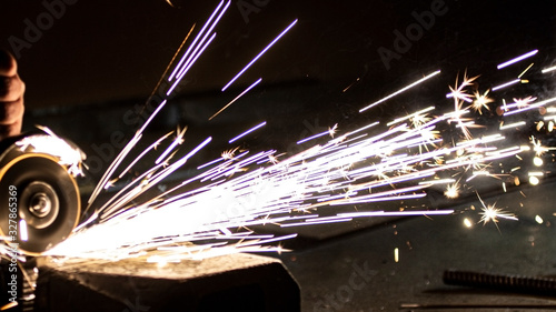 Metal processing using an abrasive wheel.