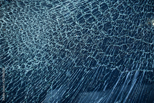 Fototapeta Cracked glass from car crash accidental with selective focusing