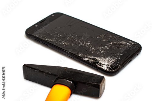 The smartphone is broken with a hammer because children are addicted to games. Isolate