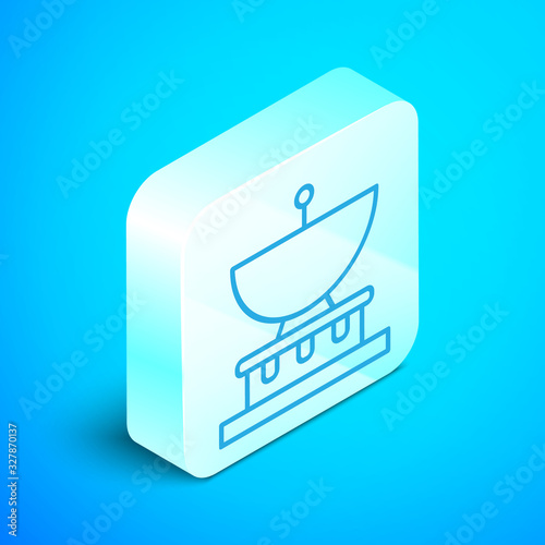 Isometric line Planet Saturn with planetary ring system icon isolated on blue background. Silver square button. Vector Illustration