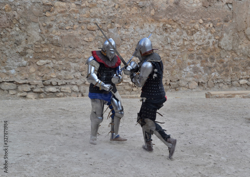 Medieval tournament, dueling christian soldiers. In Atalaya castle, Villena,Spain, in its medieval market
