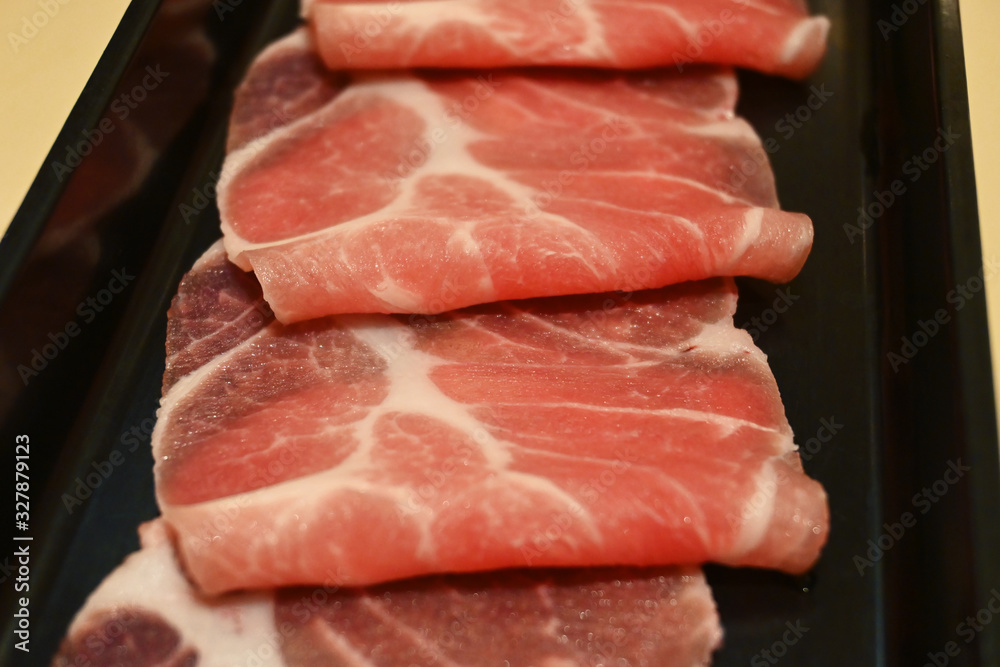 Close Up with Sliced Pork for Shabu and Sukiyaki Close Up with Sliced Pork for Shabu and Sukiyaki