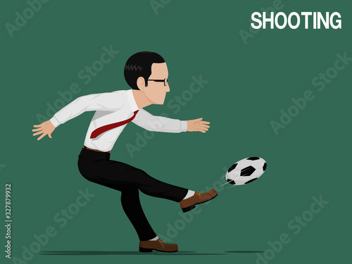A businessman is playing football