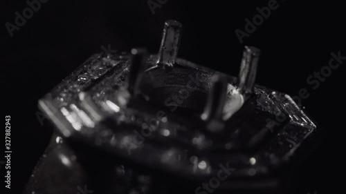 Man crafting a diamond ring jewel with his tools 