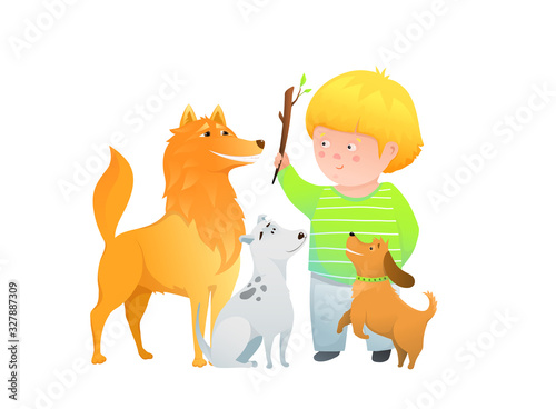 Boy kid playing training three dogs, throwing stick puppies sitting curious.