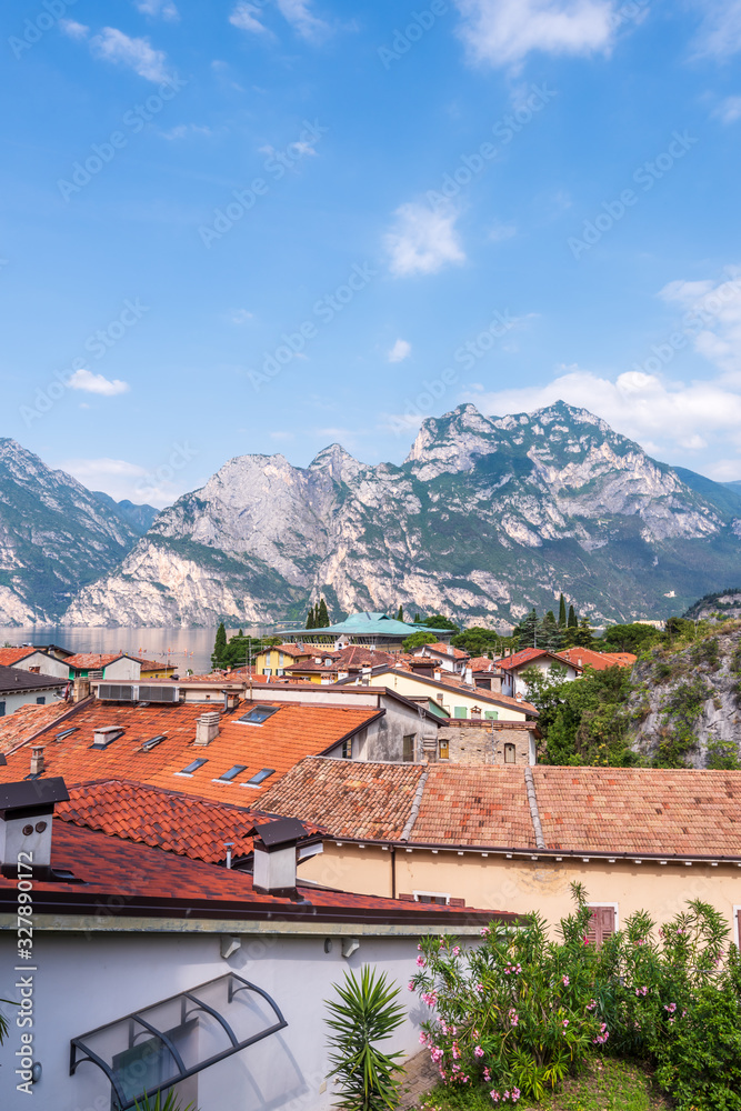 Top view to red roofs in Torbole old city, Italy.