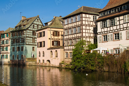 Medieval traditional half-timbered houses in the Petite France district. Pastel colors of early spring. Strasbourg, Alsace, France.