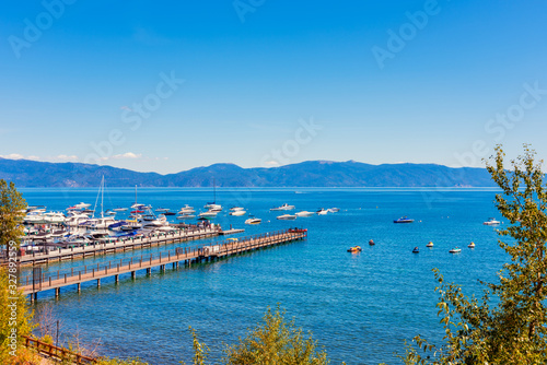 Obraz na płótnie Marina in Tahoe City, California, USA on summer day in september. The state of Nevada is visible across the water. w salonie