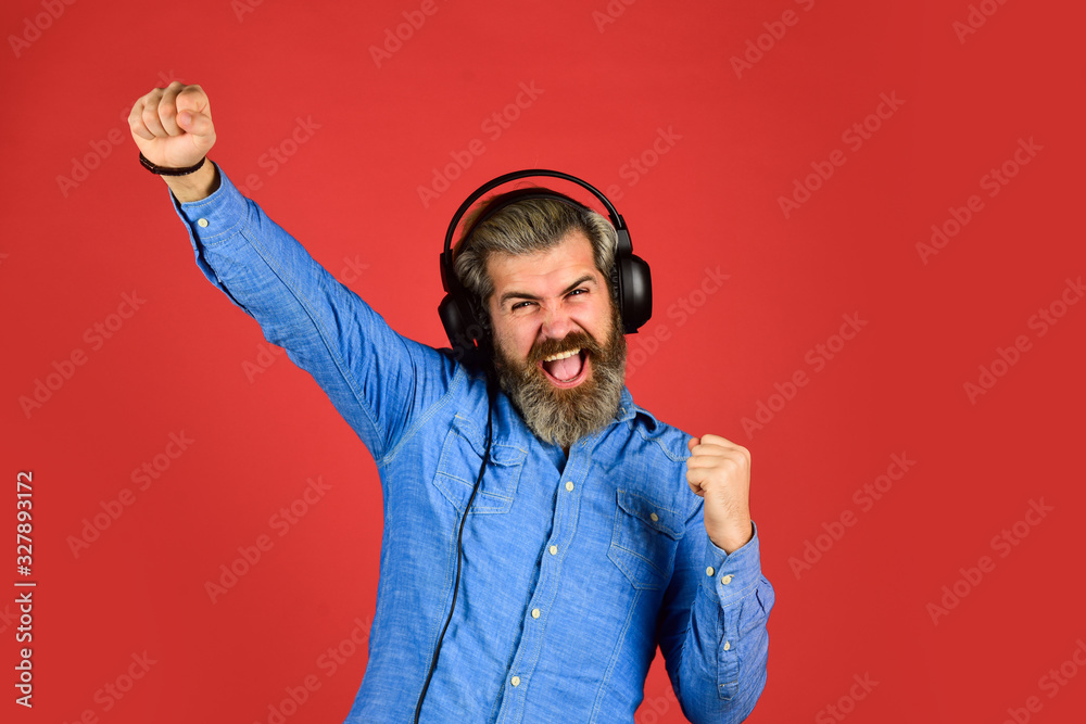 Excellent music playlist. Noise cancellation function. Professional gadget. Music beat. Rhythm concept. Man bearded hipster headphones listening music. Hipster enjoy excellent sound song in earphones Excellent music playlist. Noise cancellation function. Professional gadget. Music beat. Rhythm concept. Man bearded hipster headphones listening music. Hipster enjoy excellent sound song in earphones