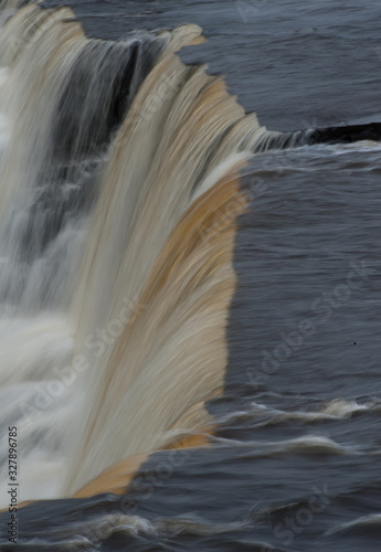 Flowing Water of a Waterfalls photo