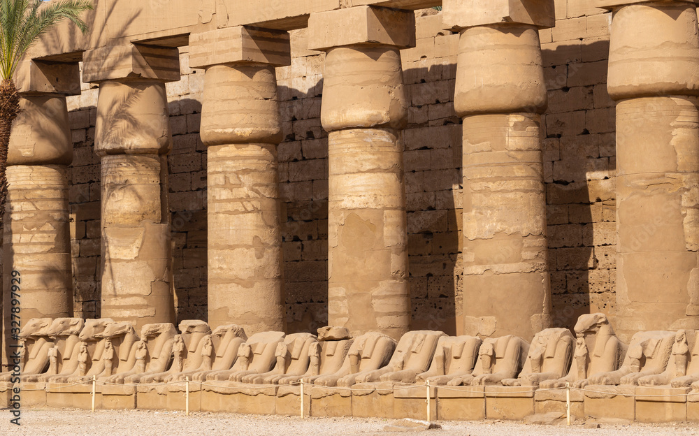 Alley of the ram-headed Sphinxes. Karnak Temple, complex of Amun-Re. Luxor, Egypt.