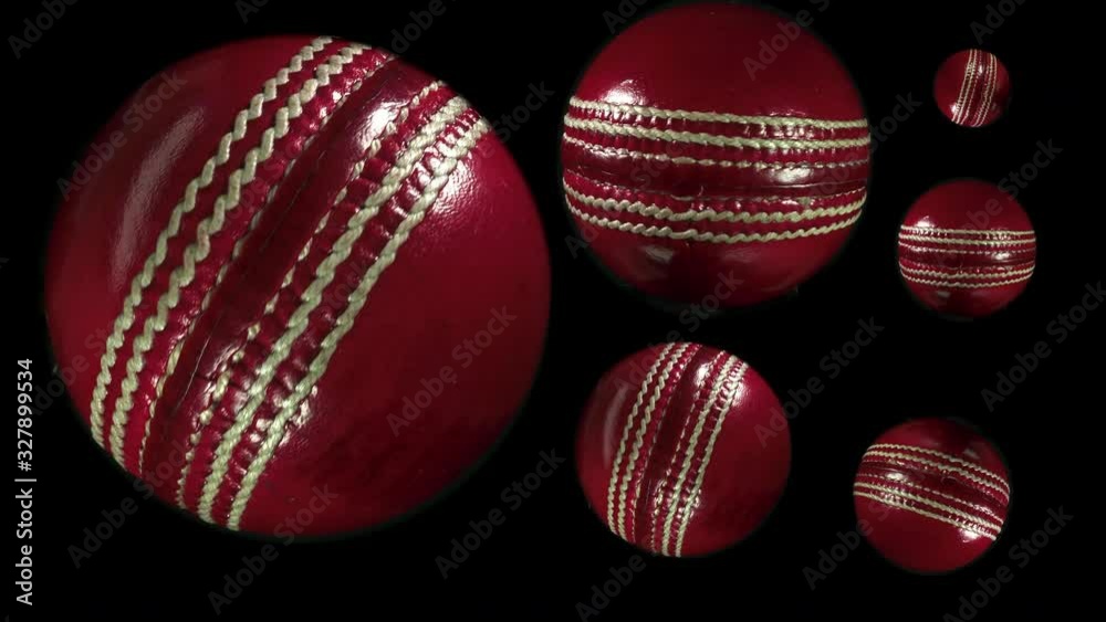 Cricket balls. Ball games and sport. Many spinning cricket balls close up.