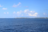 Sea, blue sky and small maldives islands