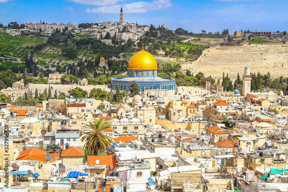 Panoramic view to Jerusalem Old city and the Temple Mount, Dome of the Rock and traditional living houses, the Mount of Olives from the church of the Redeemer. Israel
