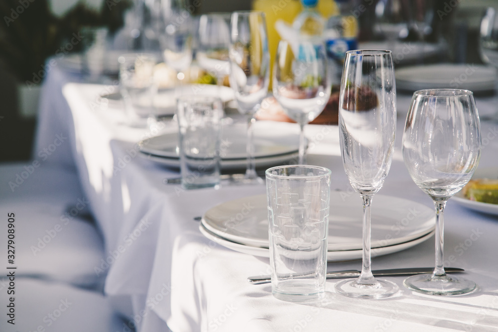 Served for banquet restaurant table with dishes, snack, wine glasses