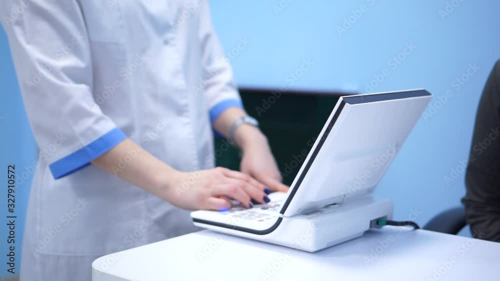 The doctor checks the eyesight of the patient. Foropter electronic automatic. Eye clinic. Health prophylaxis. The doctor checks the eyesight of the patient. Foropter electronic automatic. Eye clinic. Health prophylaxis.