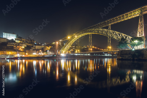 Night View of Luis I Bridge Crossing Douro River in Porto, Portugal © Donatas Dabravolskas