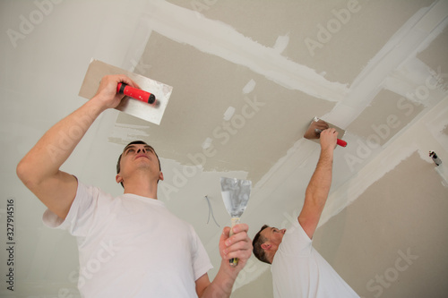Construction workers during interior decoration
