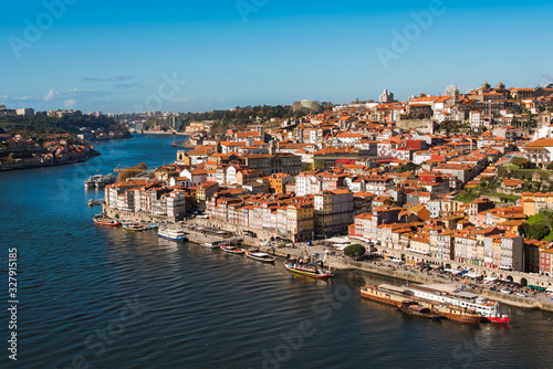 Fototapeta Naklejka Na Ścianę i Meble -  View of Historical Old Town of Porto at Douro River in Portugal