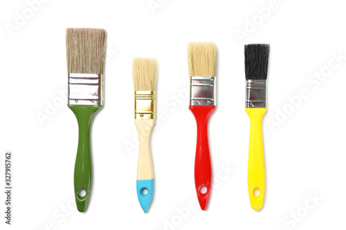 Different paint brushes isolated on white background