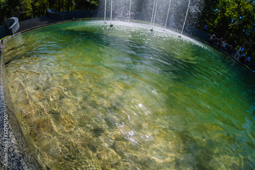 Fountain water, nature flow and stream photo