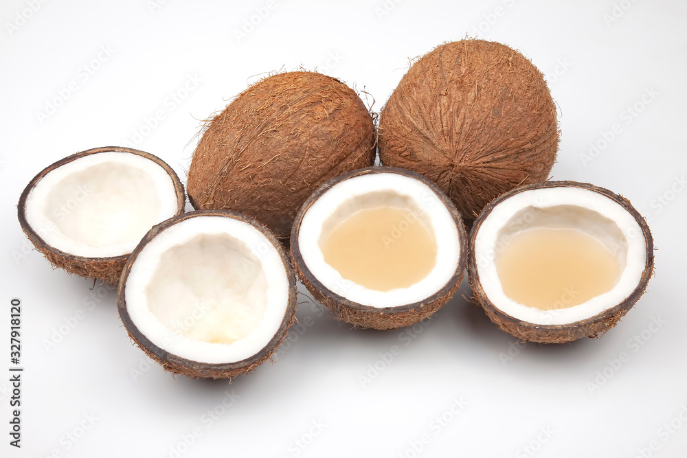 Coconut with milk cut on a white background. vitamin fruits. healthy food
